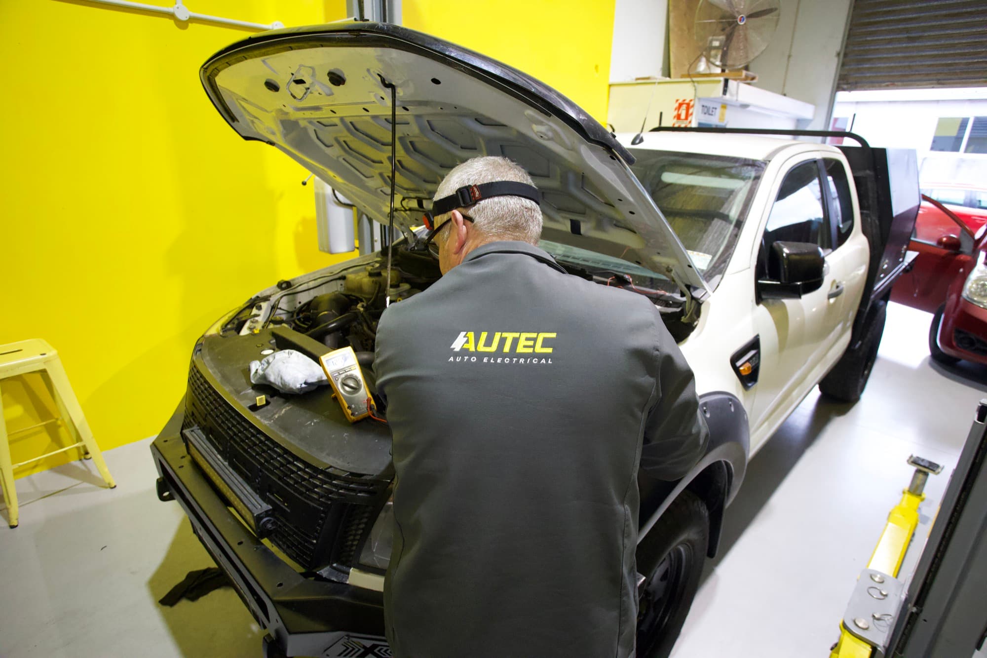 Ronnie working on a vehicle in the workshop